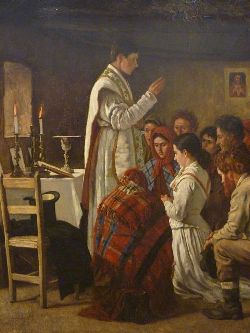 A genoux devant le prêtre